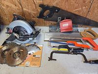 Group shot of all saws, miter box and blades