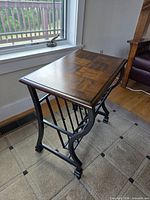 Full view of table showing wood top and metal sides