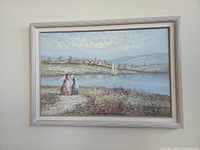 Full view of framed painting on wall