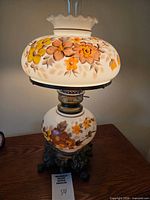 Full view of lamp showing both hand-painted globes, base and chimney