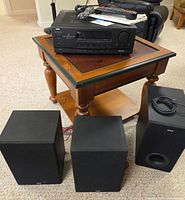 Receiver, three speakers, remote, wires overview