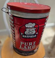 Front view showing Hatfield logo, Pure Lard text, wire handle, overall paint