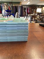 Stack of eight Canadian Journal of Archaeology issues showing spines with volumes and years