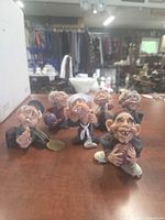 Group shot of all six Golden Creations figurines