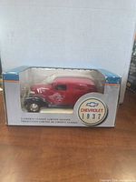 Front view of boxed Liberty Classics 1937 Chevrolet coin bank