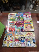 Front covers of all nine digest comics arranged in three rows of three