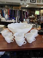 full set on table including bowl, cups, ladle