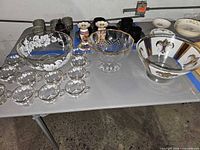 Entire group of bowls and cups on table
