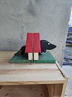 Pair of dachshund bookends together side view