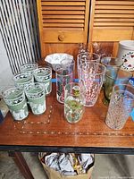 Group view of all eight glasses on table