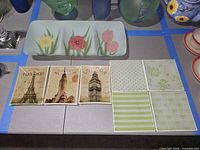 overview of large tulip tray and eight small square trays