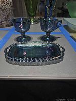 Set overview showing creamer, sugar bowl and tray