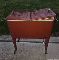 Front view showing split lid design and wheels