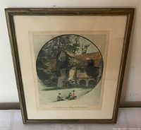 Framed chromolithograph under mat showing full artwork and frame front
