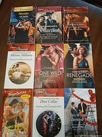 Front covers of all nine Harlequin romance paperbacks laid out 3×3