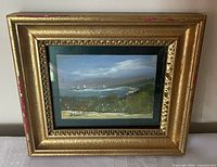 Frontal view of framed miniature oil painting showing full artwork and frame