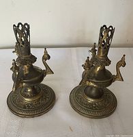 Pair of brass candlesticks frontal view