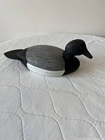 Left side view of carved Bluebill Drake decoy