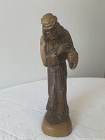 Front view of carved olive wood Jesus figurine