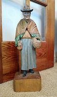 Front view showing full figurine on base
