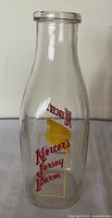 Front view showing Mercer's Jersey Farm red and yellow graphics