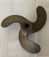 Full view of propeller front showing three blades and hub