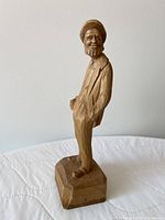 Front view of carved wood figurine