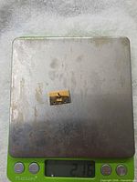 Pin on digital scale showing 2.16 g