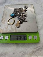 All items on scale reading 33.48 g