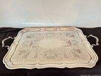 Full view of engraved silver-plated Birks tray with handles
