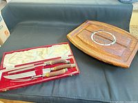 Overall view of carving board and case with utensils
