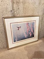 Full view of framed Don Li-Leger print with gold frame and mats