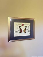 Framed Falcons print showing artwork, mat and frame