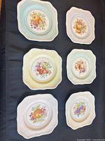 Group shot of all six Johnson Bros square luncheon plates