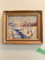 Front view of framed oil painting showing full artwork and frame