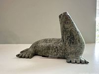 Full view of soapstone seal sculpture showing entire form and finish