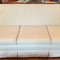 Close view of seat cushions and fabric pattern