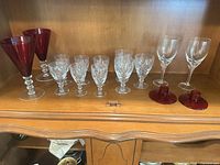 Full set on cabinet shelf showing all items
