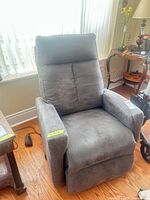 Front view of gray microfiber electric recliner