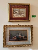 Overall view of both framed prints on wall