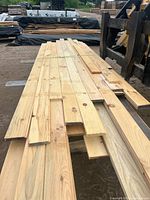 Stack of pine tongue and groove boards on pallet