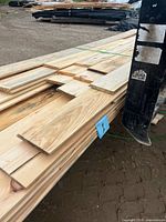 Stack of pine shiplap boards