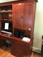 Front right view of assembled desk and hutch showing drawer hardware and overall finish