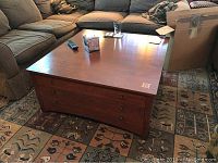 Front-left angle showing top surface, left side, and front drawer