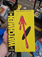 Front cover of Watchmen paperback graphic novel