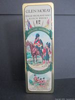 Full front view of Glen Moray whisky tin showing complete graphics and dimensions