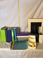 Group shot of binders, sheet protectors, letter trays, magazine holders and desk organizer