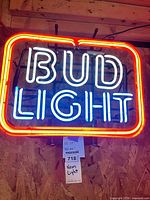 Front lit view showing Bud Light logo illuminated and overall design