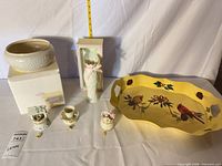 All seven items arranged: bowl on box, vase in box, tray, trinkets