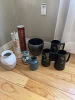 Group shot of all nine ceramic and porcelain pieces